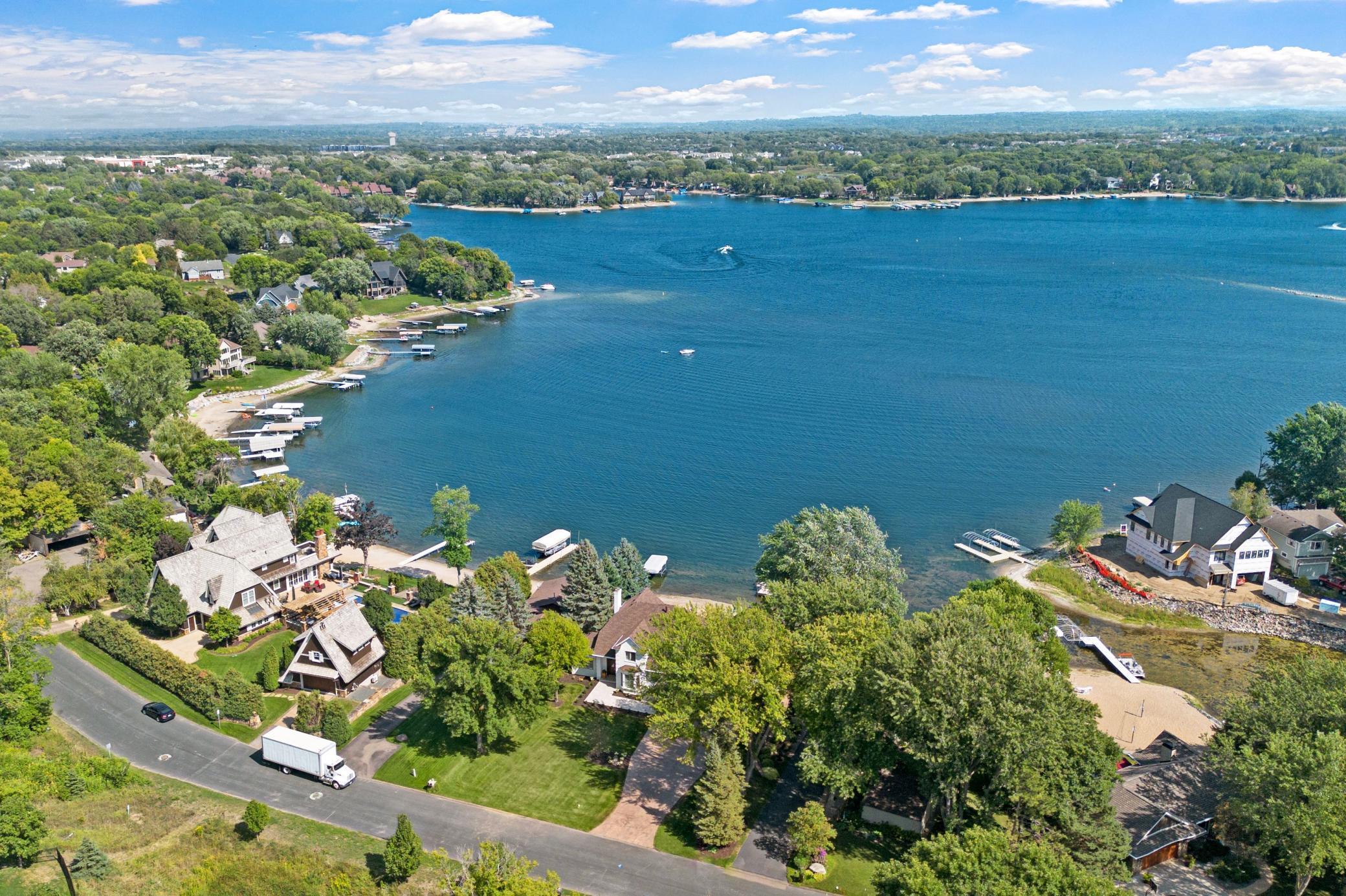 105 feet of sandy lakeshore sloped from the walk out and the convivence of being so close shopping, commuting, dining and more.