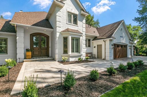 A closer look at the elegant double-door entry, creating a grand and welcoming entrance to this beautiful Prior Lake home.
