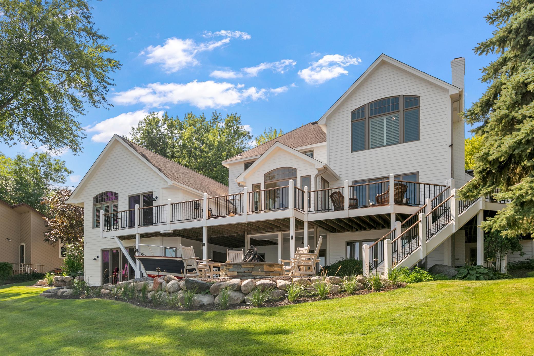 The perfect backyard for hosting, relaxing, and enjoying time by the water.