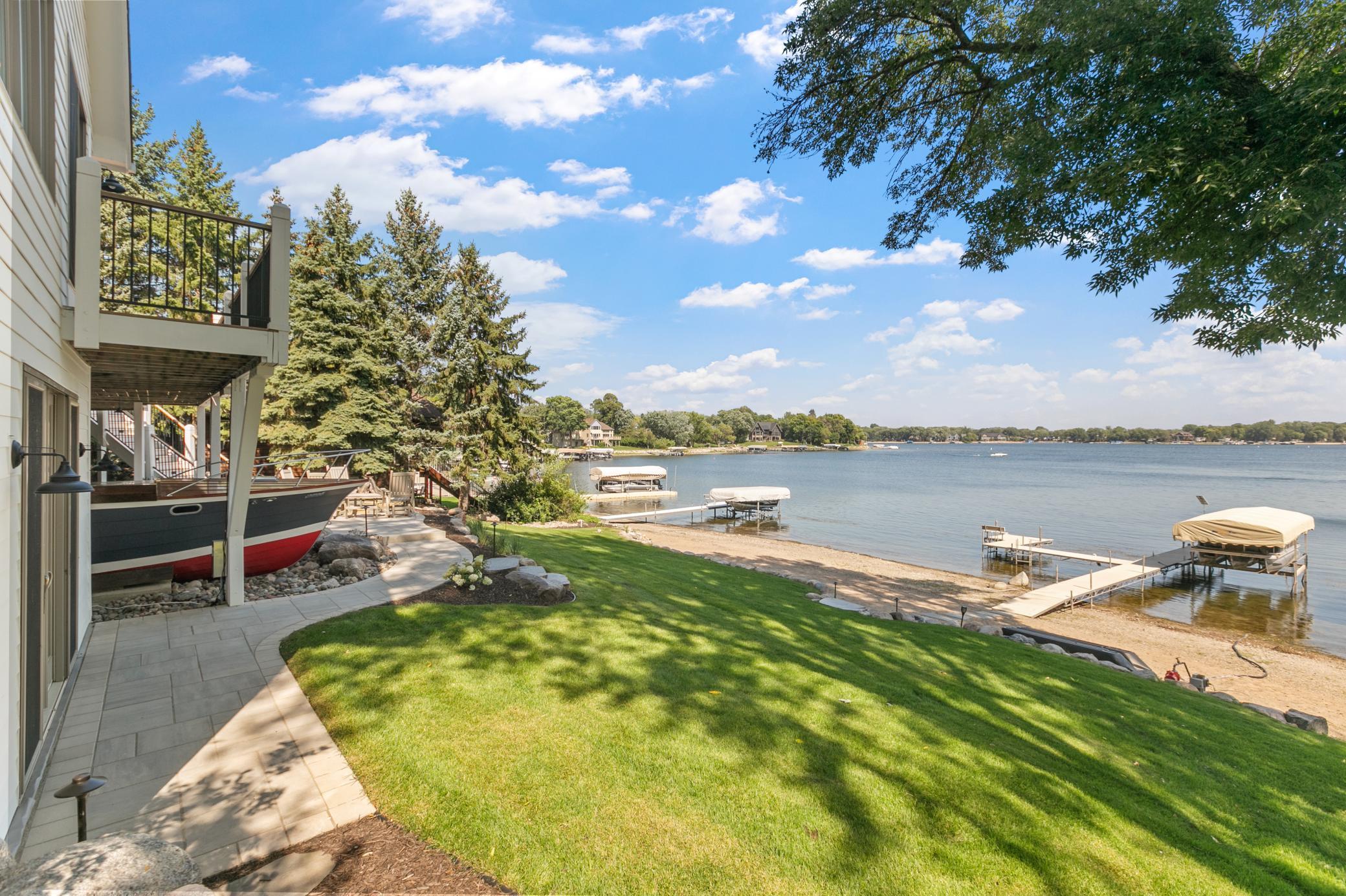 Peaceful views of the shoreline and open water create the perfect lakeside setting.