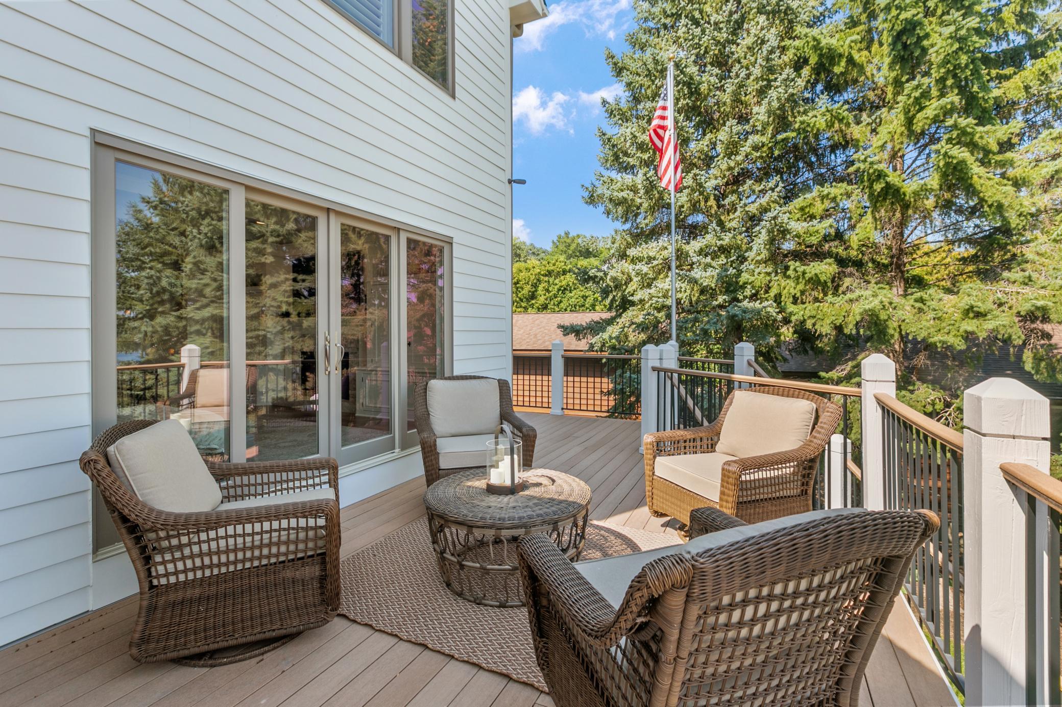 Huge maintenance free deck with room for seating as well as sunning and dining.