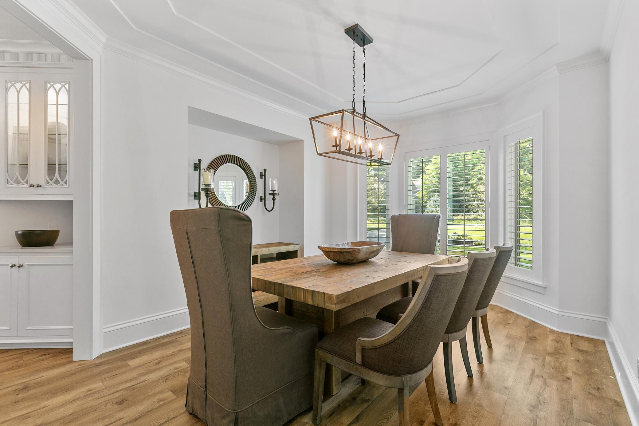 Elegant formal dining room, perfect for hosting holiday meals and memorable gatherings.