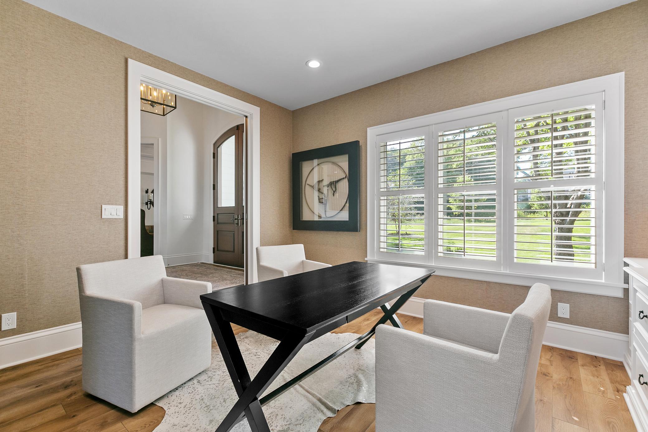 Dedicated main-level office just off the front door with privacy from the rest of the living space