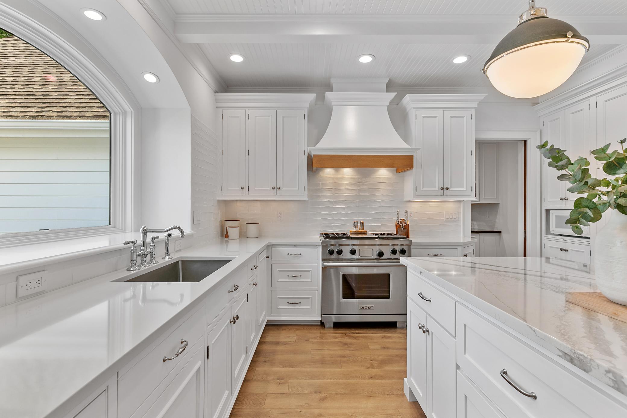 Enjoy beautiful lake views right from the kitchen, complemented by luxury appliances and a thoughtfully designed cooking space.