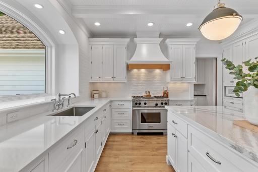 Enjoy beautiful lake views right from the kitchen, complemented by luxury appliances and a thoughtfully designed cooking space.