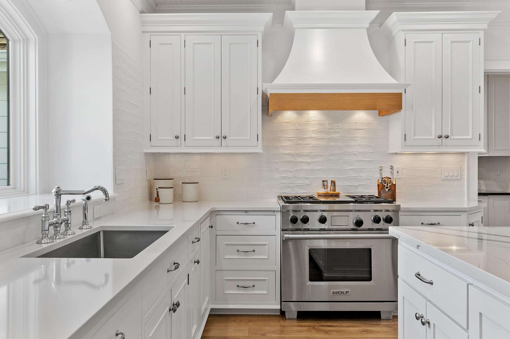 Enjoy beautiful lake views right from the kitchen, complemented by luxury appliances and a thoughtfully designed cooking space.