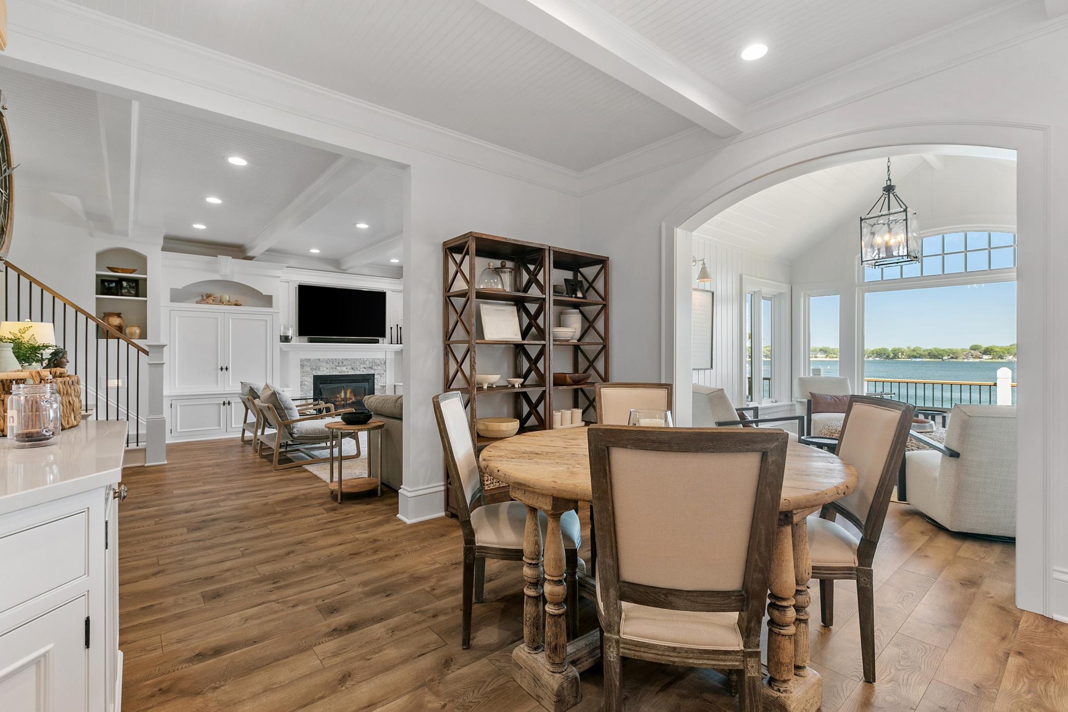 Enjoy meals at the kitchen table while taking in beautiful lake views, with the sun room just steps away.