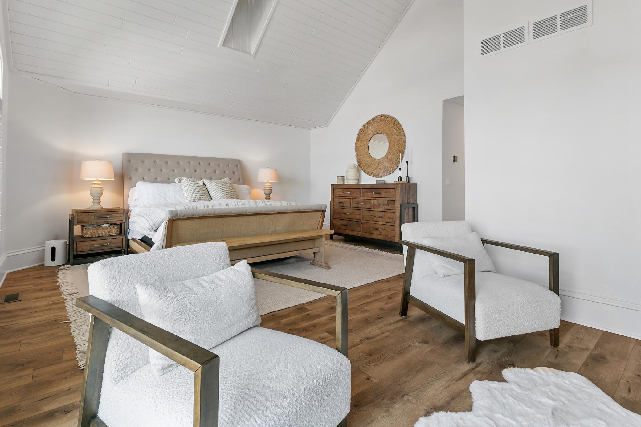 Spacious primary suite with soaring vaulted ceilings, designed as a peaceful retreat with elegant finishes and thoughtful details throughout.