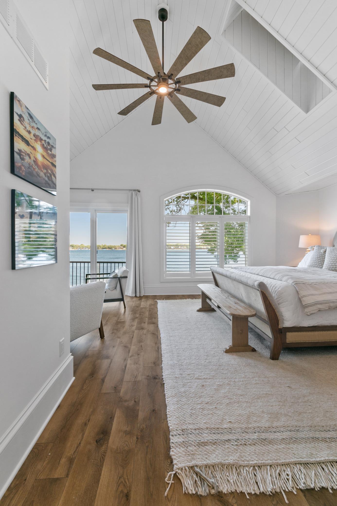 Wake up to beautiful lake views right from the comfort of the primary bedroom.