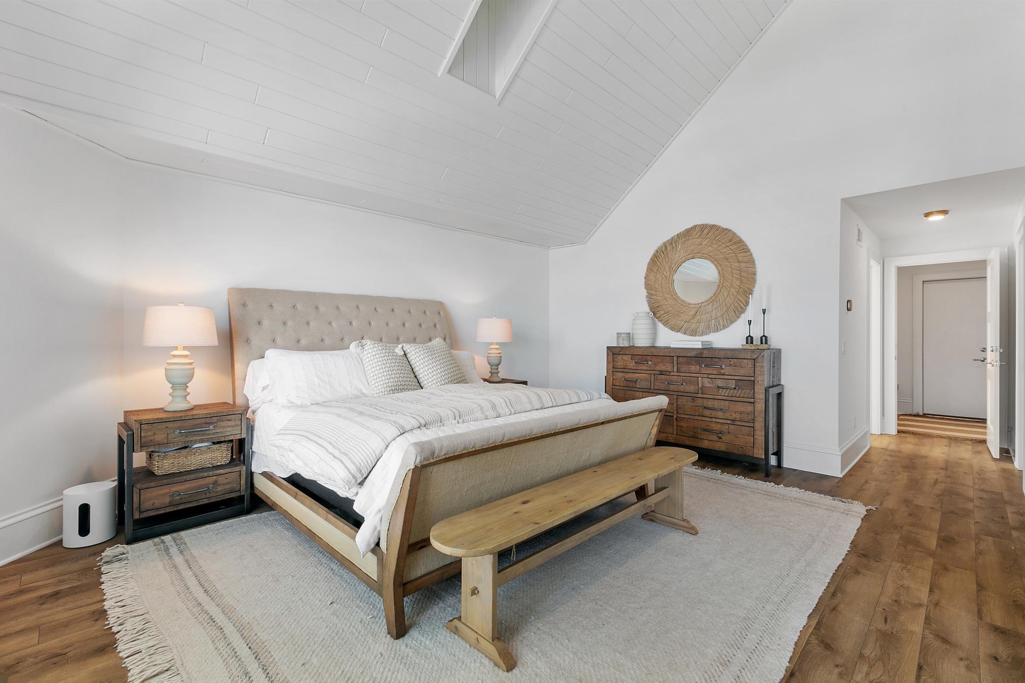 Spacious primary suite with soaring vaulted ceilings, designed as a peaceful retreat with elegant finishes and thoughtful details throughout.