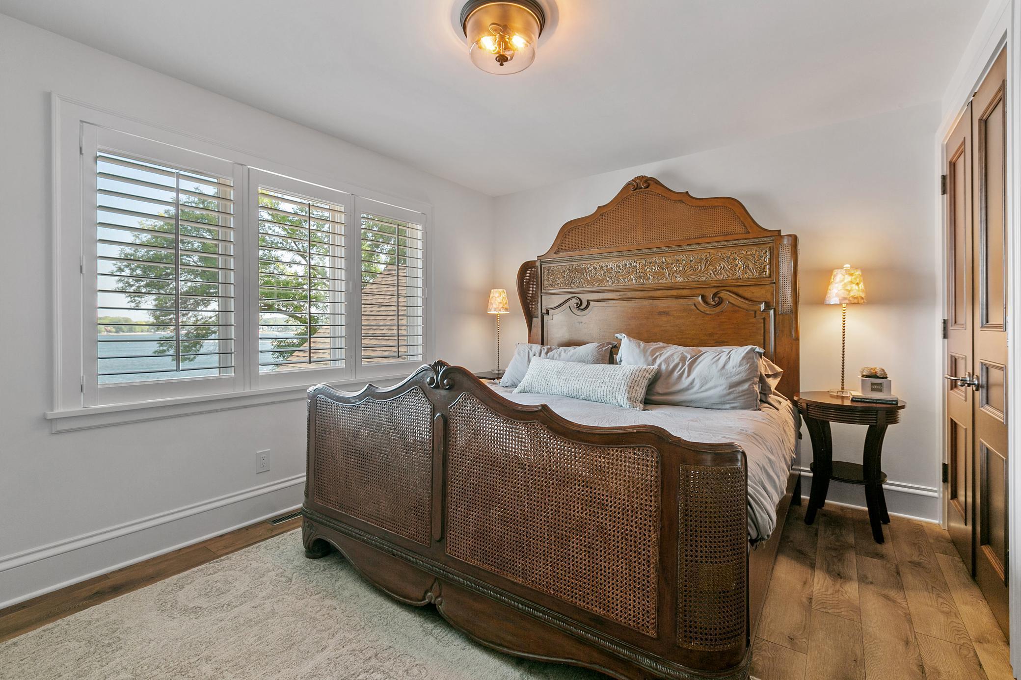 Bedroom #4 on the upper level has a huge lake view!