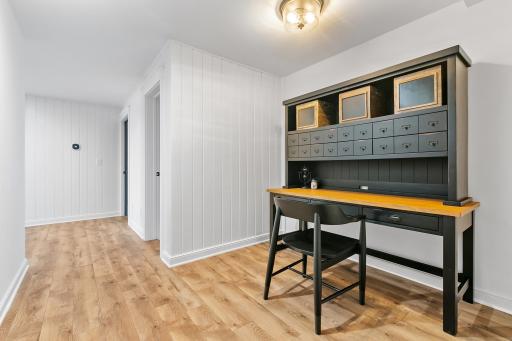 This hallway entrance from the family room to the fifth bedroom adds great space for kids, luggage, etc.