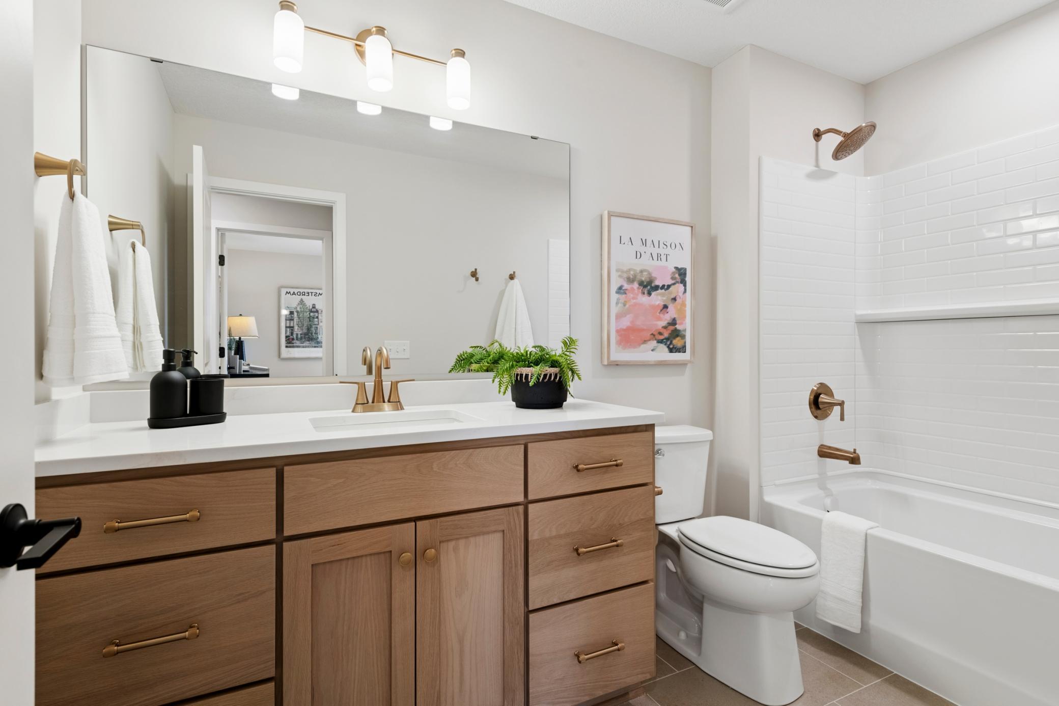 Upstairs main bath. *Photos are of like home and may not depict actual home plan. Configurations, features, materials and finishes may contain options that are not included in the price.