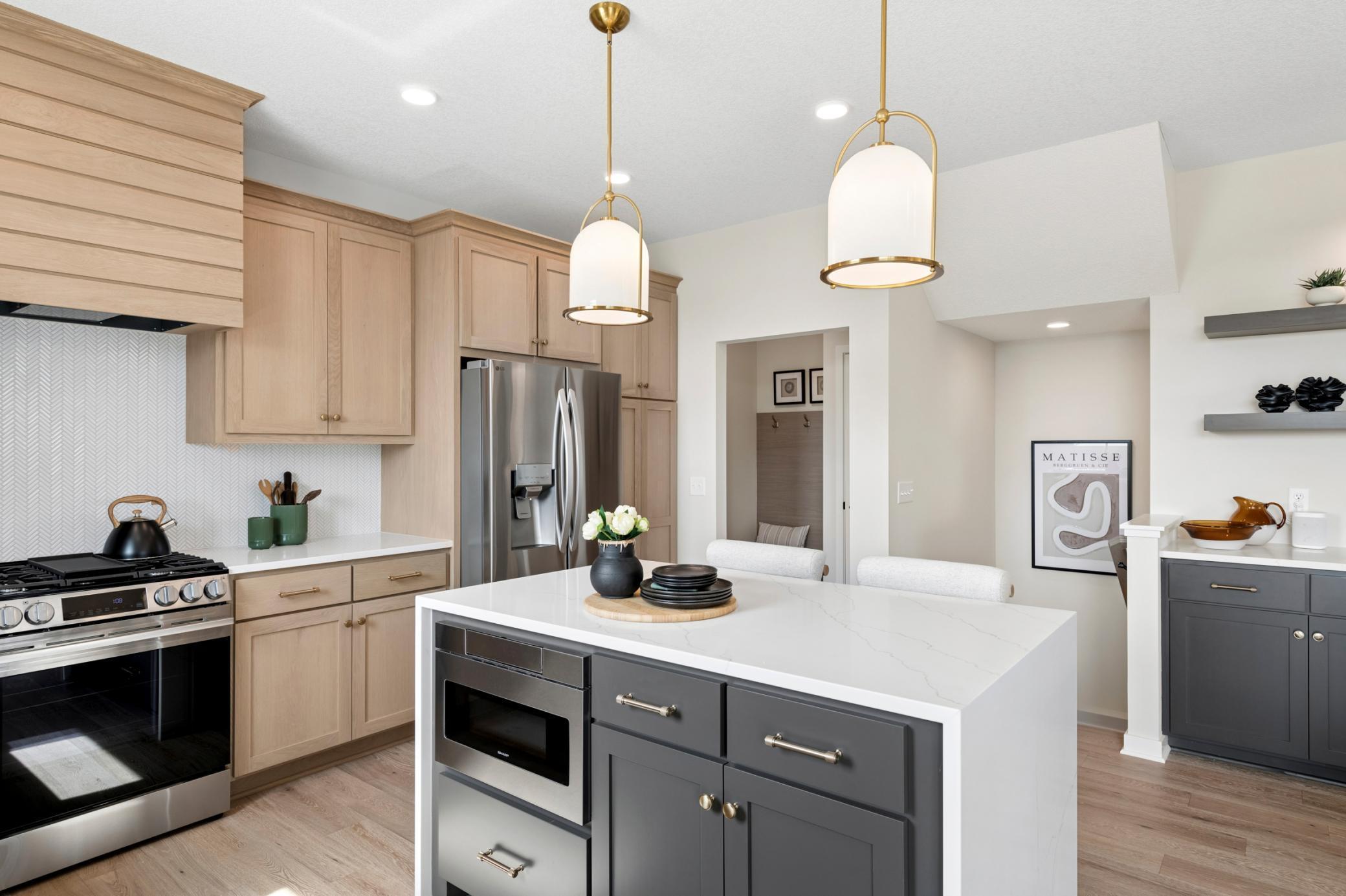 Microwave drawer seamlessly built into the island, maximizing counter space. *Photos are of like home and may not depict actual home plan. Configurations, features, materials and finishes may contain options that are not included in the price.