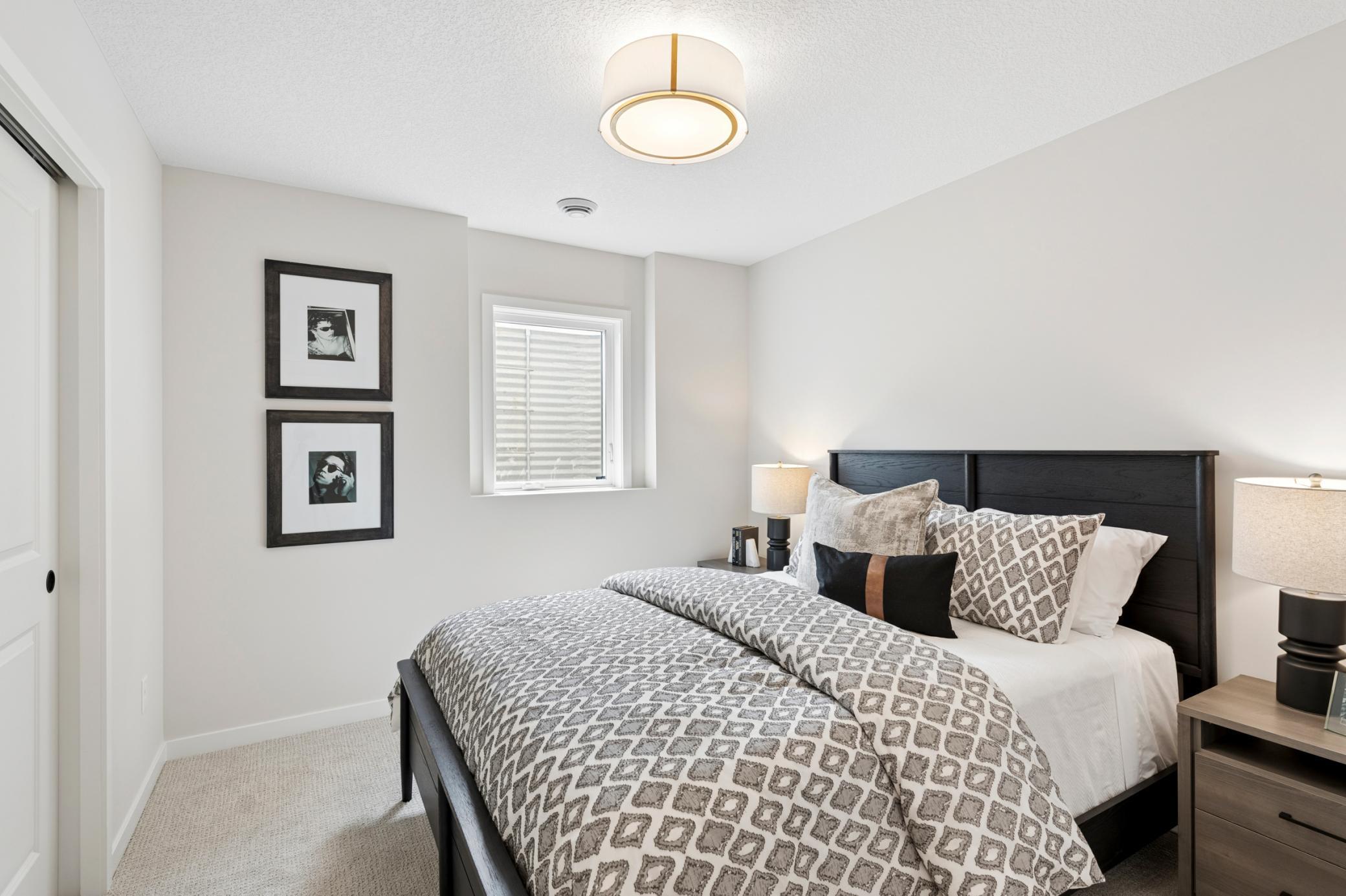 Lower level bedroom for the out of town guests. *Photos are of like home and may not depict actual home plan. Configurations, features, materials and finishes may contain options that are not included in the price.