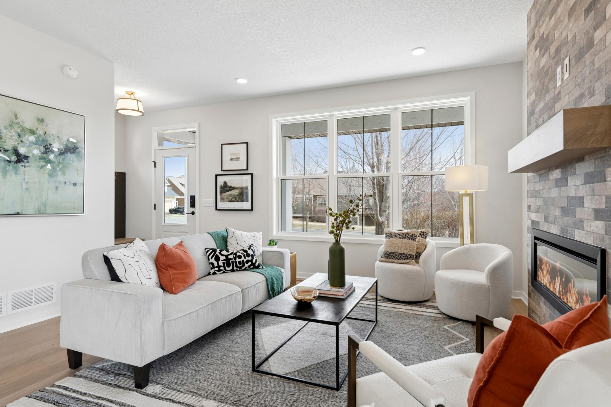 Gathering room is designed for both comfort & style. *Photos are of like home and may not depict actual home plan. Configurations, features, materials and finishes may contain options that are not included in the price.