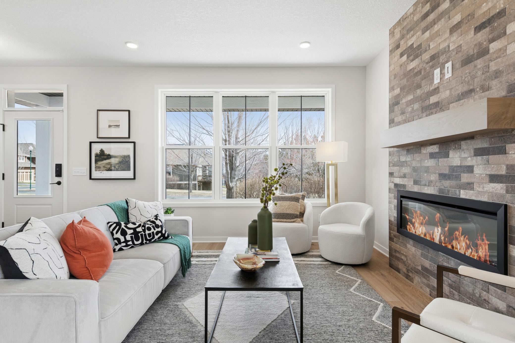 Gathering room is designed for both comfort & style. *Photos are of like home and may not depict actual home plan. Configurations, features, materials and finishes may contain options that are not included in the price.