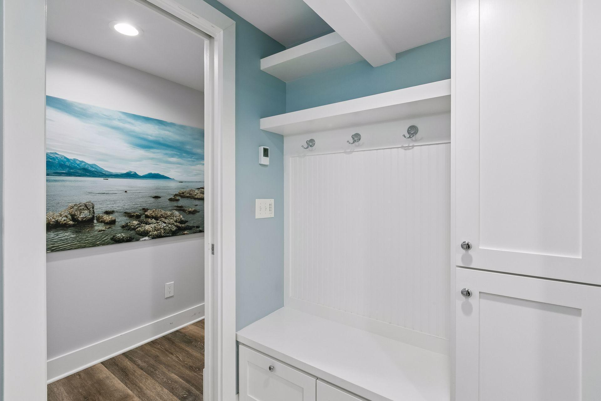 Sitting/dressing area with built in bench.