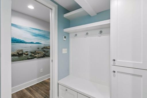 Sitting/dressing area with built in bench.