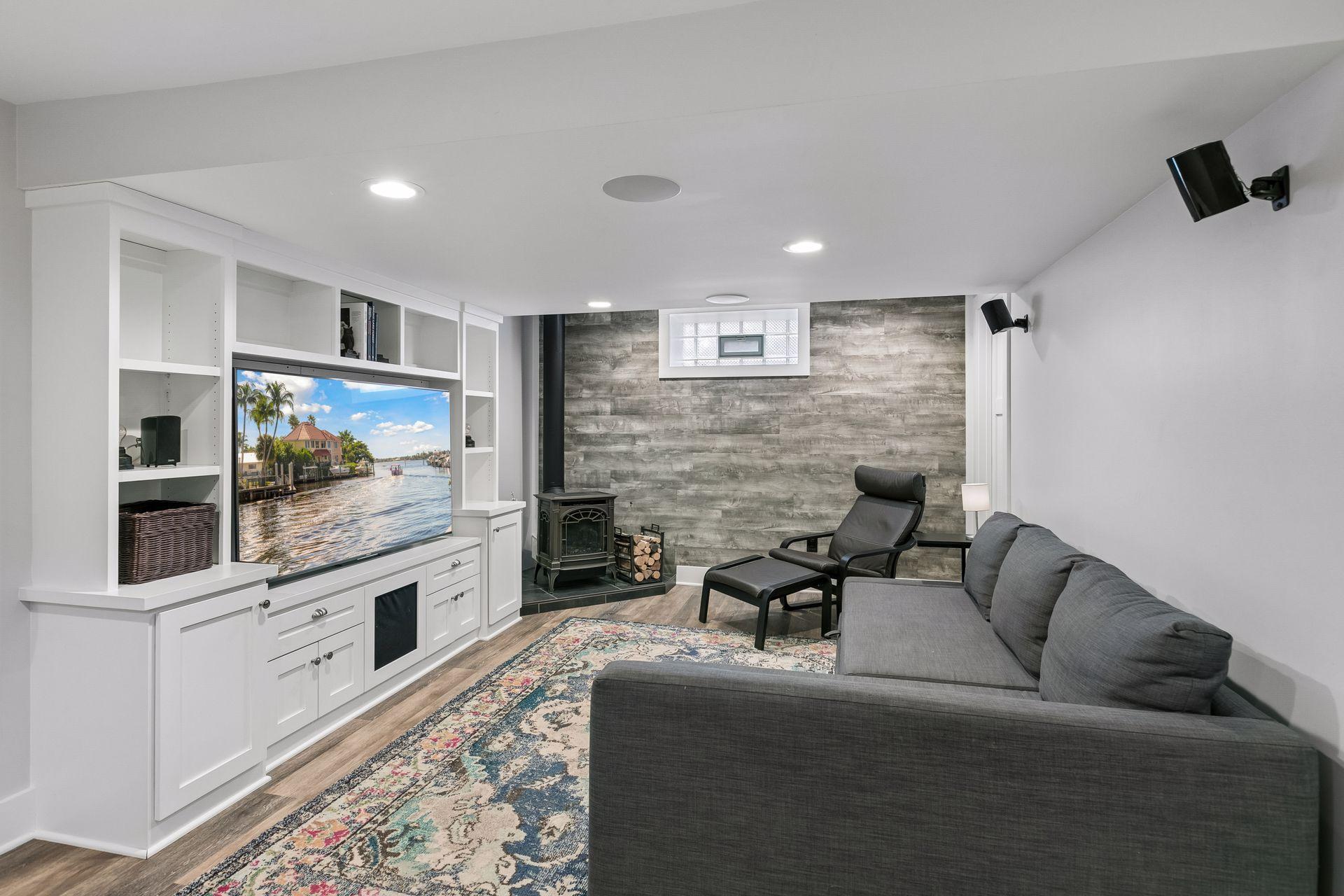 Cozy Basement Living Space with a fireplace.