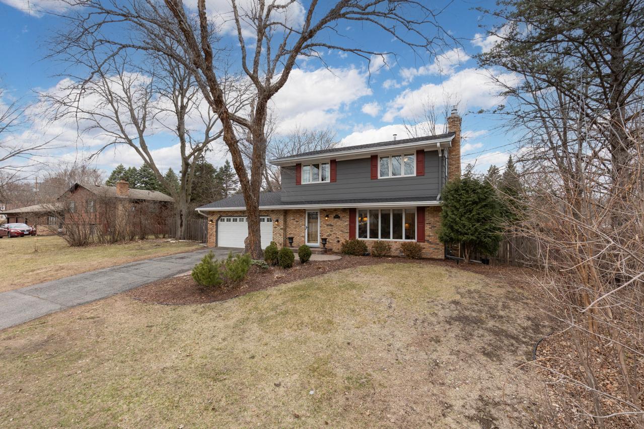 Exceptional in every way, this beautifully maintained home is perfectly nestled on a stunning 0.53-acre lot with a park-like backyard surrounded by mature trees and lush landscaping—all within the highly sought-after Minnetonka School District.