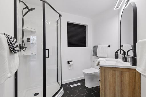 Designed with guests in mind, this 3/4 Bathroom offers visitors comfort, privacy, and convenience.