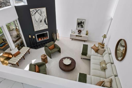From the loft, an elevated perspective overlooks the Great Room, creating a unique sense of openness and connection throughout the home.