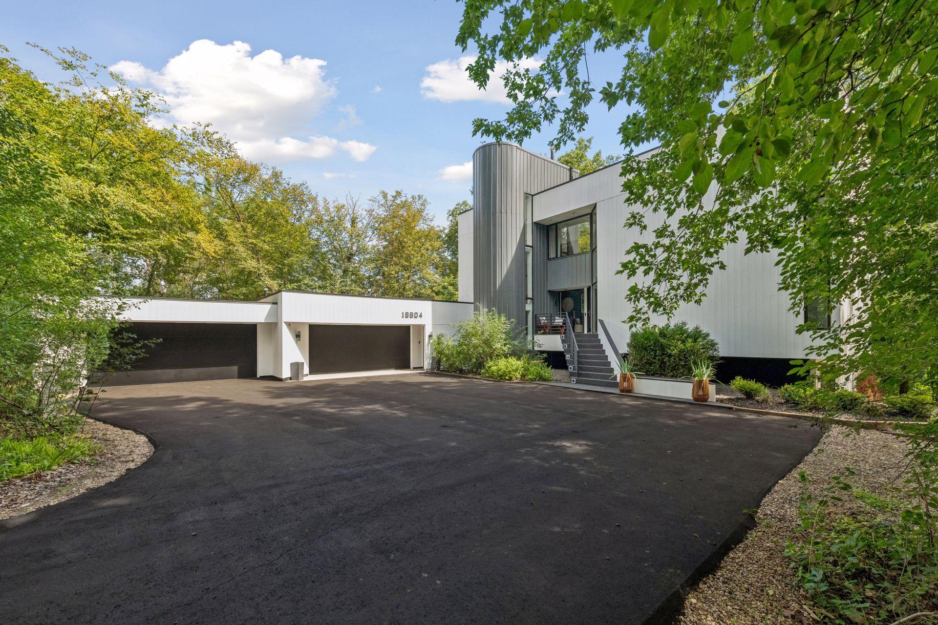 Welcome to a truly one-of-a-kind residence, perfectly positioned in the heart of Minnetonka. From its distinctive architecture and character-filled spaces to its exceptional setting, this is a home that stands apart.