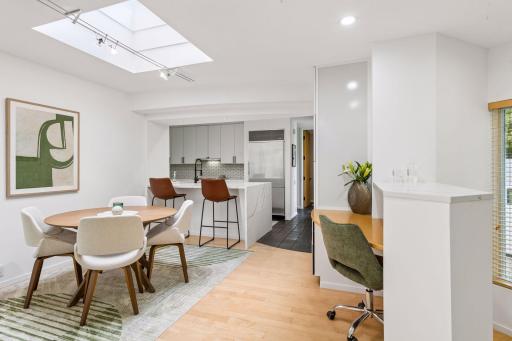 The Kitchen is designed for both everyday living and connection with a bright breakfast nook and built in planning desk.