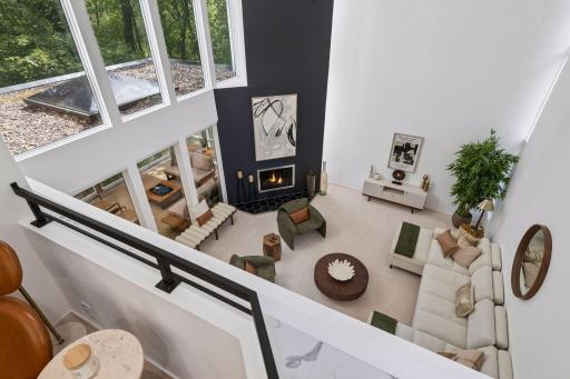 From the loft, an elevated perspective overlooks the Great Room, creating a unique sense of openness and connection throughout the home.