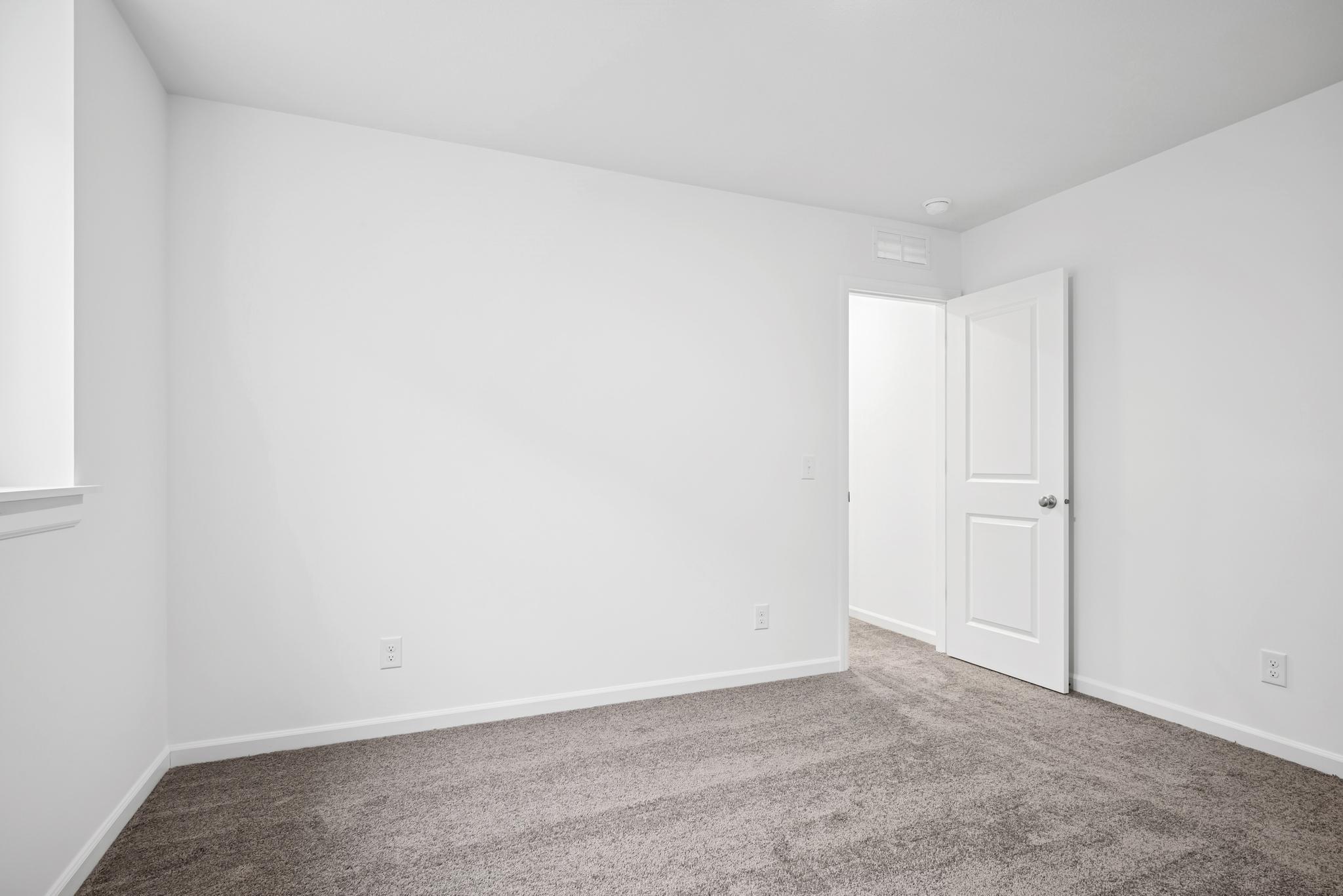 Basement bedroom 5. Picture of a completed Pryor home.