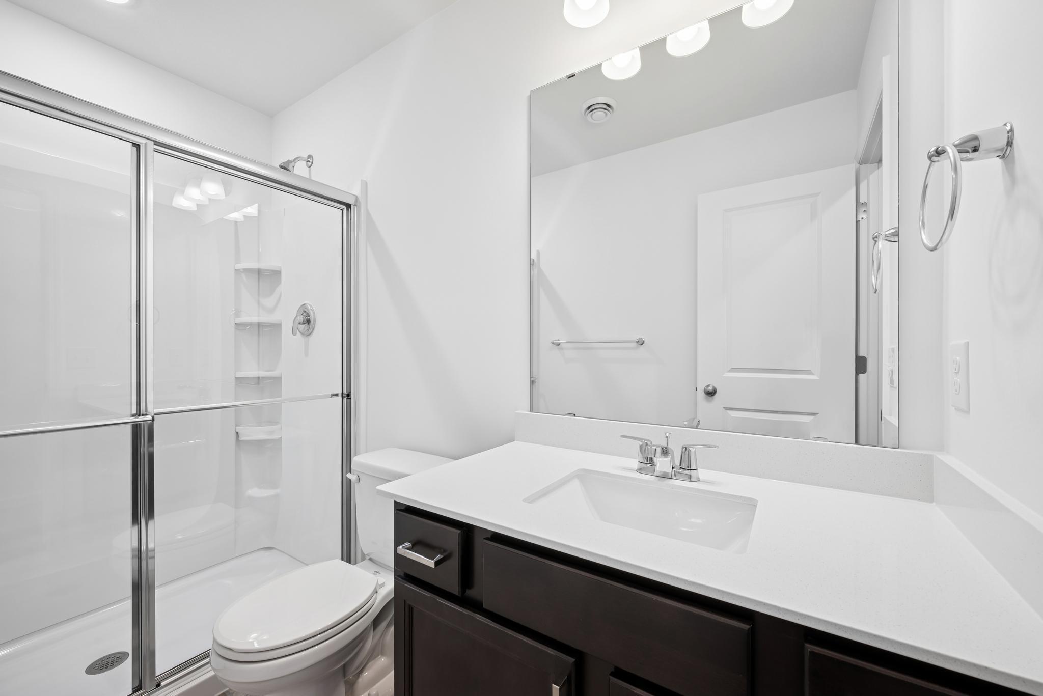 Basement bath. Picture of a completed Pryor home.