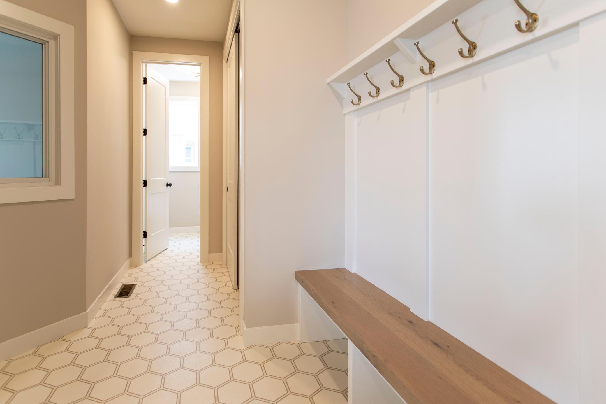 Mudroom access off 3 stall garage