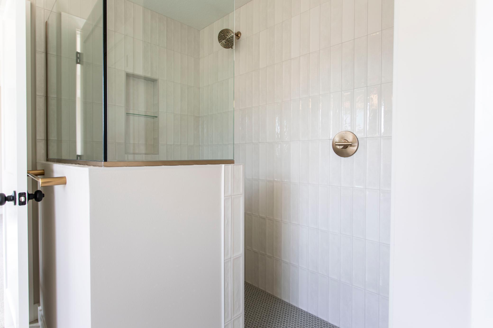 Primary walk in all tile shower