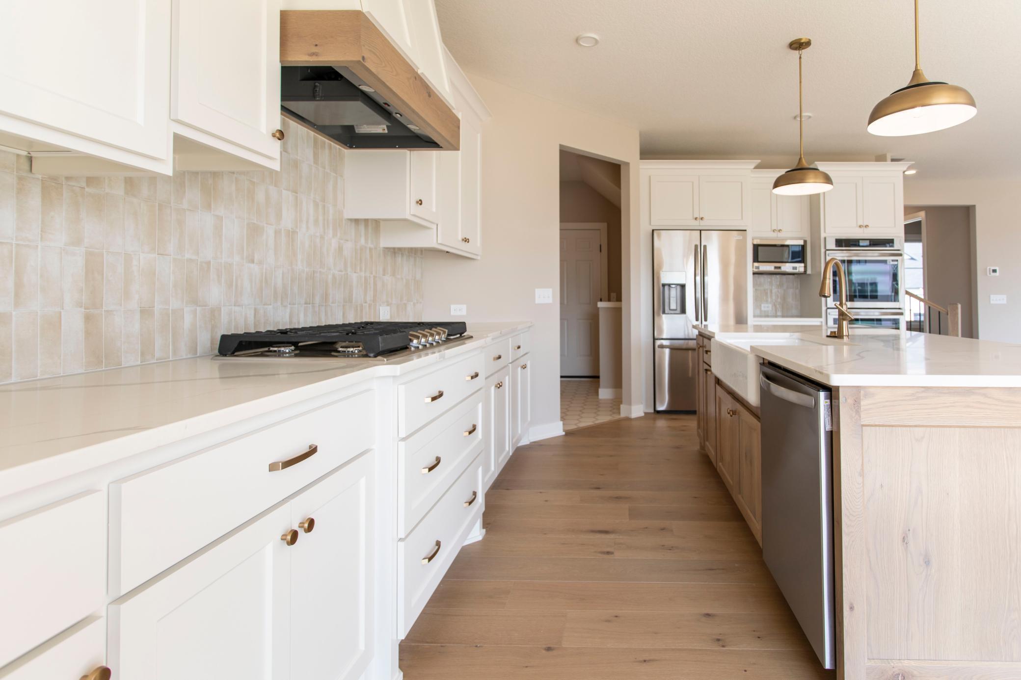 Luxury kitchen package cooktop, hood vent and custom cabinets