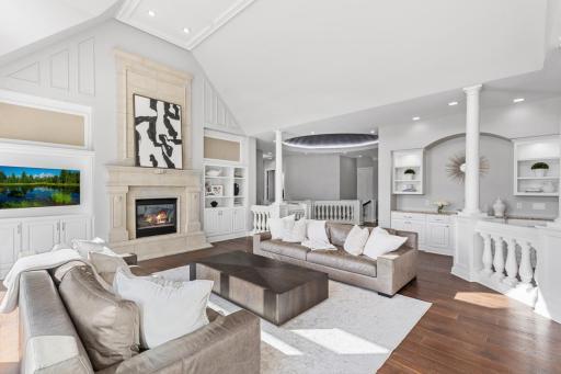 Neutral finishes and warm hardwood flooring throughout