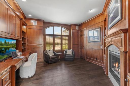 Executive office with matching hardwoods for a cohesive feel