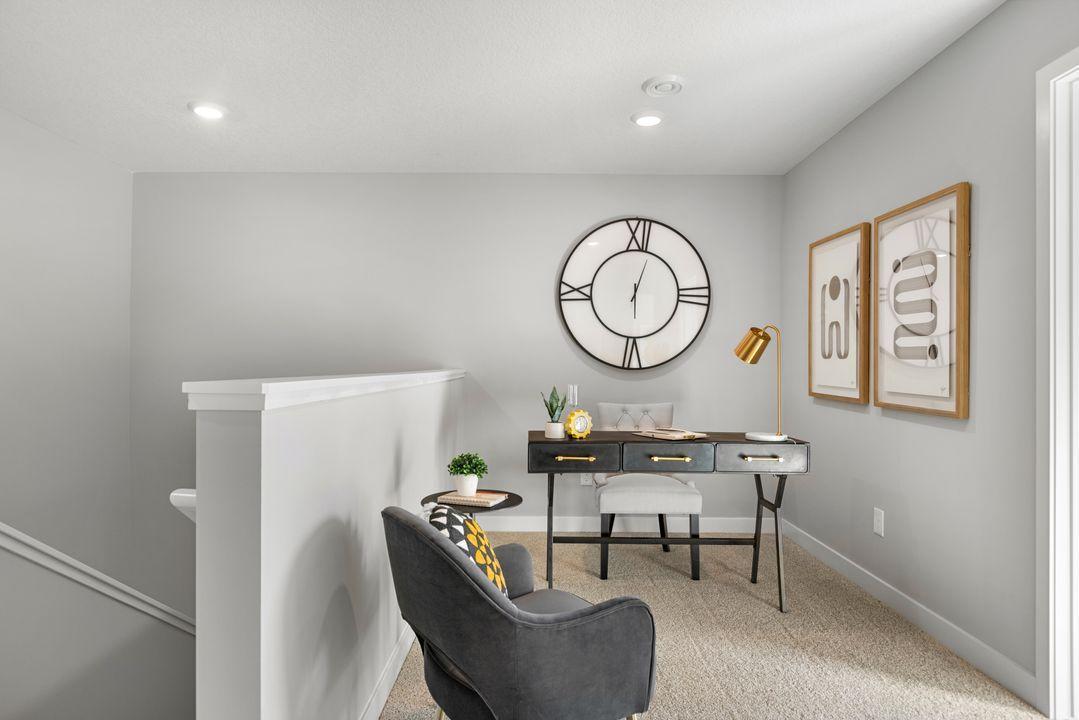 Upper-level loft lends itself to so many options - office, playroom, sitting area - you choose! Photo is of model home. Colors and options may vary. Ask Sales Agent for details.