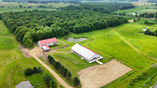 525 233rd St Baldwin, where luxury meets land and opportunity. This gorgeous property has 29.76 acres total across multiple parcels, including 17 acres of pristine woods, multiple home sites, a 7200SF event venue and 5600 sf luxury barndominium.