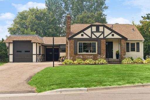 Welcome home to 2123 Fairways Lane with lovely tudor detailing and lovely landscaping. Over 800 sf of heated garage space with a door height that accommodates today's larger vehicles.