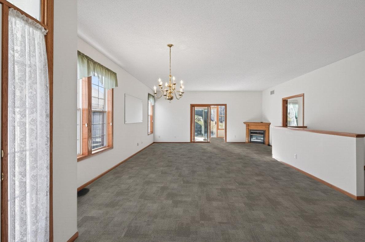 See what $4,300 in flooring change can do for the entire 1st floor and stairs. Photo Edited