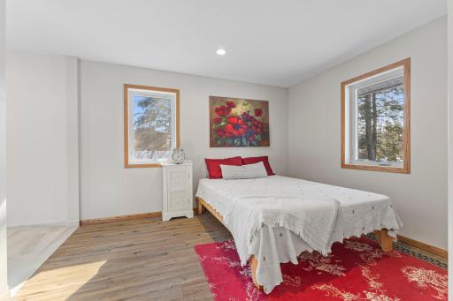 The bedroom is spacious with dual windows for abundant natural light!
