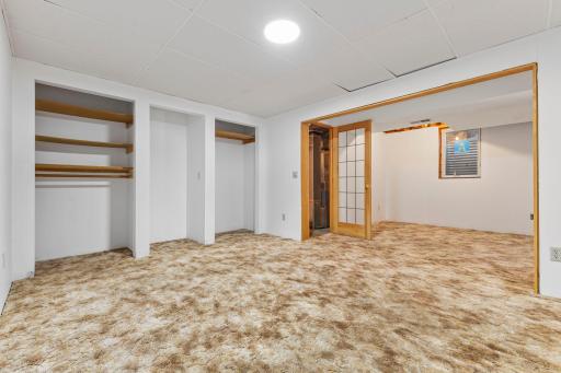 Downstairs, you'll find a partially finished flex room.