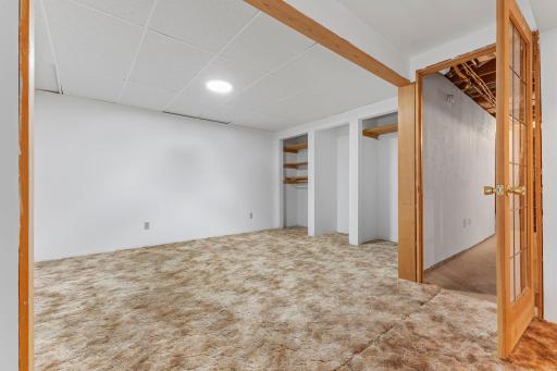 Versatile space ready to fit your needs. Perfect as a playroom, home gym, hobby room, and more!