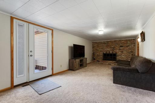 Walkout lower level with wood-burning fireplace