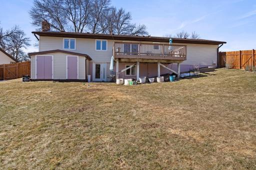 Large, fully fenced back yard with storage shed