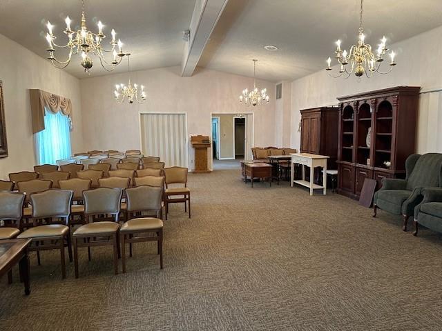 North room carpeted, vaulted ceiling