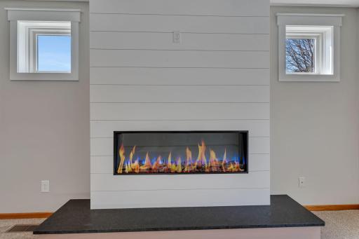 Electric fireplace that doubles for ambiance as well as a heat source.