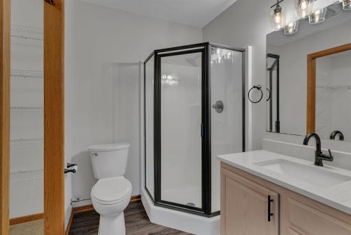 Refurbished Shower with New Doors, Countertops, Flooring and Fixtures