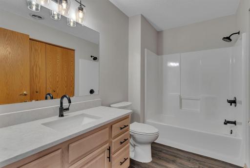 Refurbished Tub/Shower, New Flooring, New Countertop, New Fixtures and Fresh Paint Throughout
